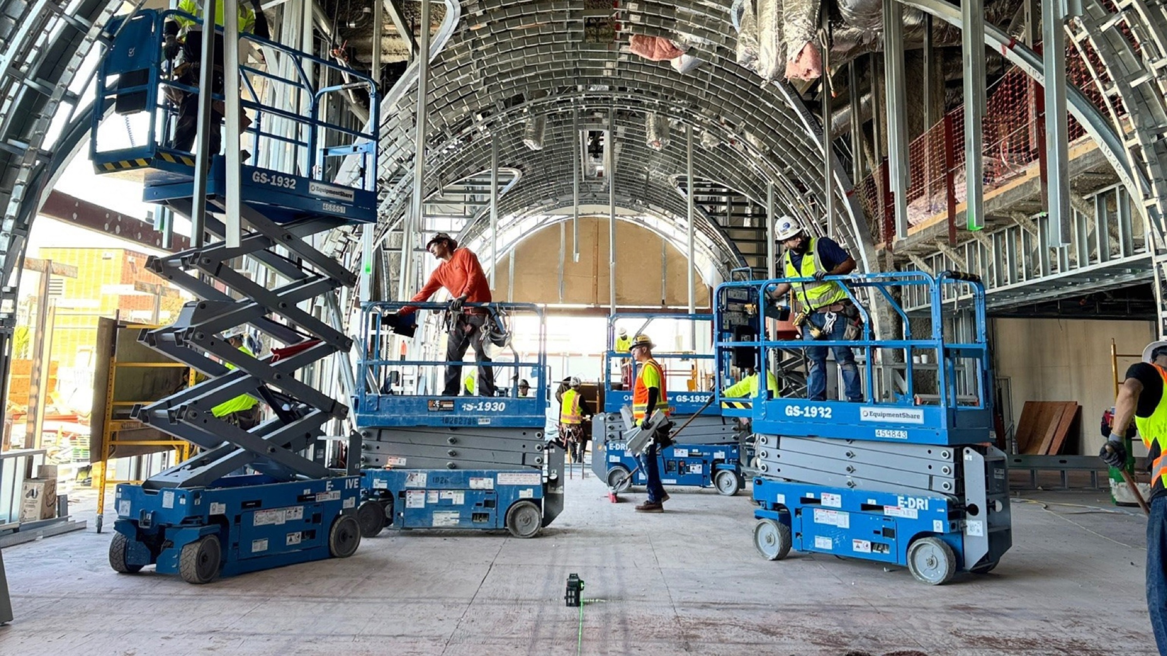 BKB crew framing a barrel-vault ceiling