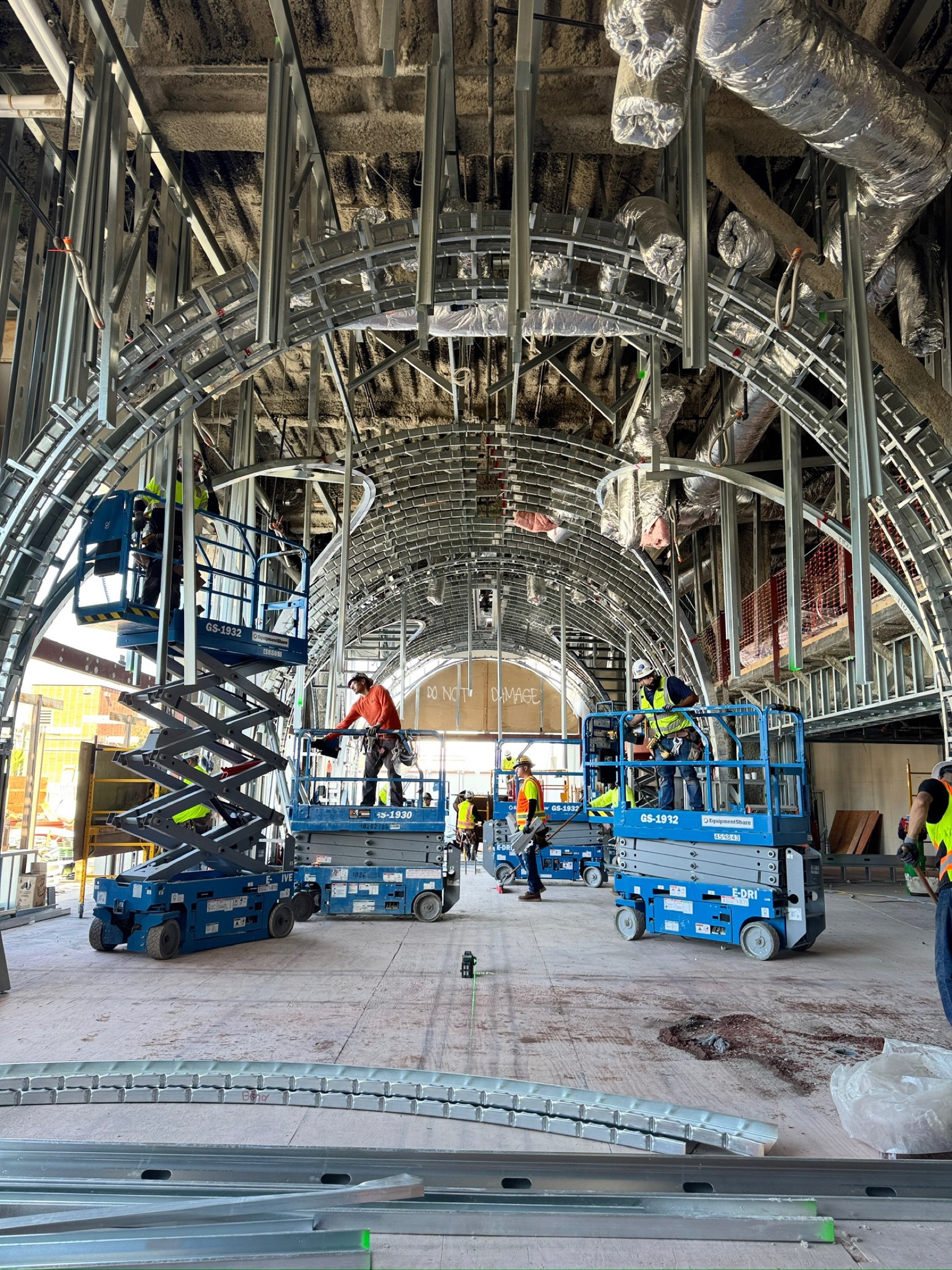 The BKB crew framing a barrel-vault ceiling